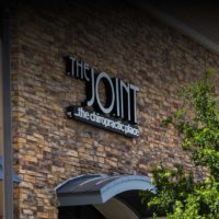 The Joint The chiropractic place sign