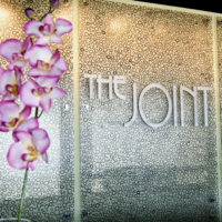 The Joint Chiropractic Franchise store logo